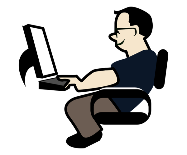 Slouching person working at a computer.